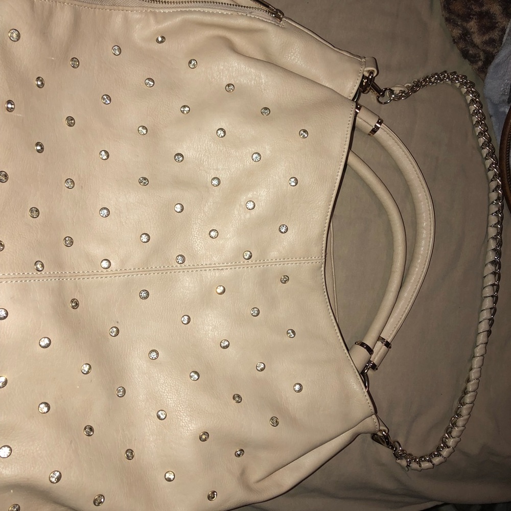 Beautiful beige purse with diamond studs all over